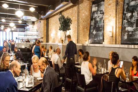 What makes Rebelle a 'modern classic' restaurant experience?